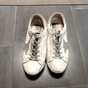 Women’s Golden goose size 39. White superstar sneakers with silver star.